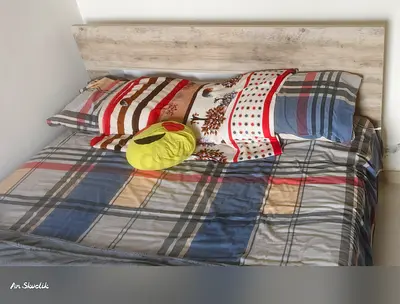 Queen-size bed frame with wood-effect headboard (used)