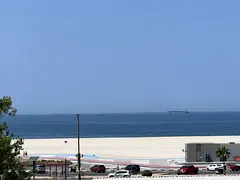 One bedroom and hall - Ajman Corniche - Two bathrooms - Split AC - Balcony with sea view - For famil