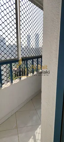 Three bedrooms and a living room in Al Majaz 3 with a balcony and three bathrooms Open view