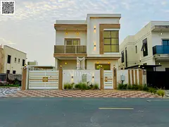 Luxury modern villa for sale in Al Zahia – Ajman, including all utilities, water and electricity, 