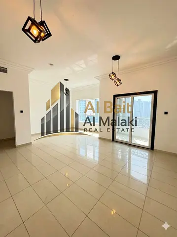 Two-bedroom apartment with master rooms, a living room, a laundry room, a balcony, a swimming pool, a gym, and a sea view.
