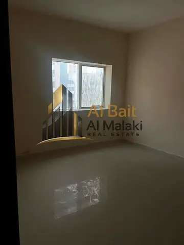 Two bedrooms and a living room in Al Nahda On the Dubai exit , open views