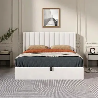 My white upholstered bed frame with tall paneled headboard