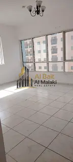 3-Bedroom Apartment with Living Room and Maid’s Room for Rent in Al Taawun – Private Parking and