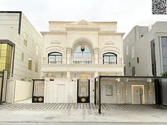Opportunity to own a two-story villa in the most prestigious area of ​​Ajman, with a rooftop, in