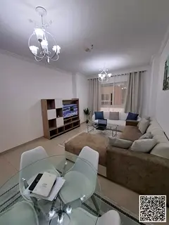 Luxury one-bedroom apartment with a balcony and open views. Ajman, Al Yasmin Towers. Fully furnished