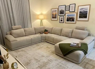 Modern L-shaped sofa with chaise lounge, offering maximum comfort and space-saving design for any ho