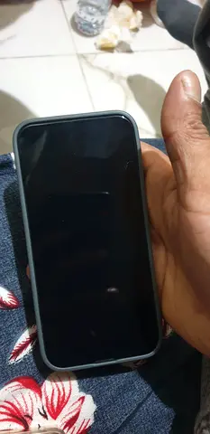 iPhone with blue silicone case - good working condition