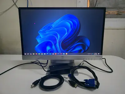 HP 22 Inch HDMI LED monitor with power adapter and VGA  HDMI cables.