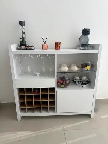 White bard cabinet with wine rack, glass holders and storage