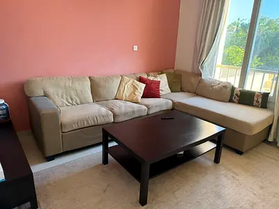 Beige L-shaped Sectional Sofa with Chaise and Coffee Table