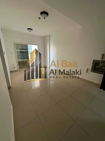 Two-bedroom apartment with a living room and balcony for rent in Al Taawun | Directly on the Dubai exit | Free parking