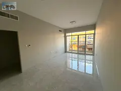 a premium two-bedroom apartment with a living room located in Al Rawda 3 near Ammar Street. This