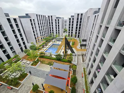 Pool view 1bedroom Only 60k with Balcony and GymPool in Tiraz Aljada community