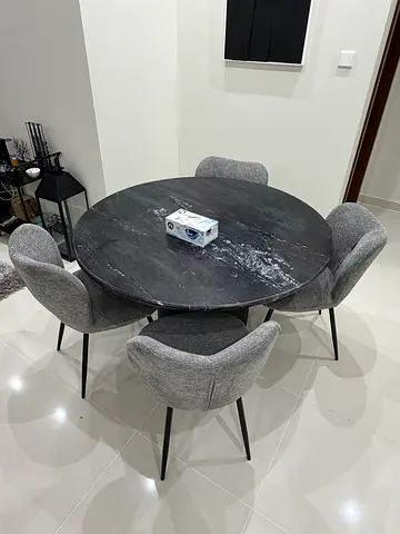 Round Marble-Effect Dining Table with 4 Grey Upholstered Chairs