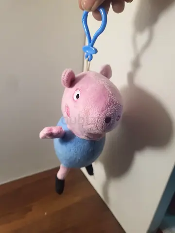 Stuffed pig animal form the show pepa pig