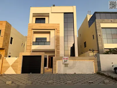 For sale: Luxury 7-bedroom villa with a roof terrace, including electricity and water, in the Al Yasmin area of ​​Ajman. Prime location, freehold owne
