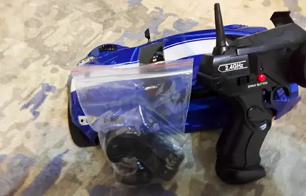 My blue RC racing car with 2.4GHz remote (spare parts included)