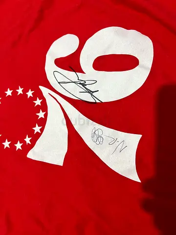76ers shirt signed by The professor and Noel Robinson