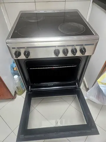 My stainless steel electric range with ceramic hob and oven - working