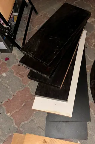 Set of used black bookshelf shelves and floating shelves