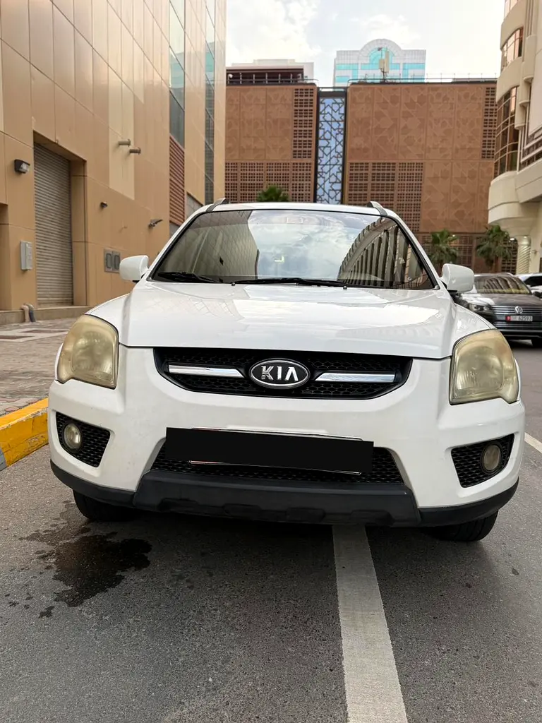 Kia Sportage 2009 — photo 1 of 11