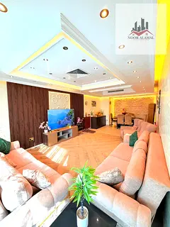 Sharjah, Al Nahda, two-bedroom apartment with a living room,kitchen, and two bathrooms