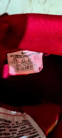My red Nike sneakers - US.9.5 (tag shown) original md.in.indoneshia