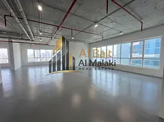 🏢✨ **Luxury Office for Annual Rent in Al Majaz 2 | Garden &amp; Lake View + Free AC and Parking