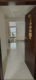 Two bedrooms and a living room in Al Majaz 3 with a balcony, two bathrooms, and a very spacious area