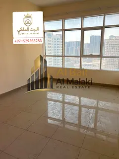 Two bedrooms, a living room, and a balcony in Al Taawun. Payment options: four or six installments.
