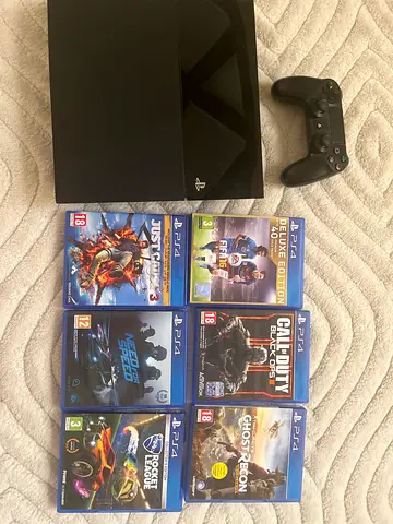 Sony PlayStation 4 Console with Games