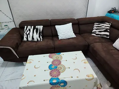 Comfortable L-Shaped Sofa with Decorative Cushions