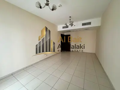Apartment for rent in Al Majaz 3, apartment no. 102, with 2 bathrooms, central AC, free parking, for AED 41,000 per year.