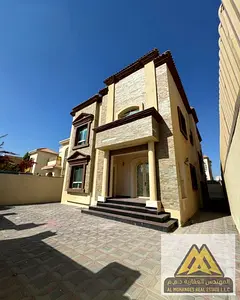 Villa for Sale in Al Rawda 1, Ajman | Stone Facade | 6 Master Bedrooms + Majlis + 2 Living Rooms | 7