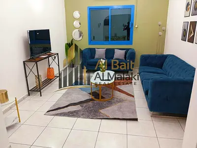 **New furnished two-bedroom apartment for annual rent in Al Majaz 3 | Near the Corniche Al Buhaira**