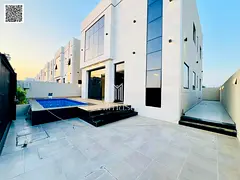 Villa for sale with a swimming pool, including registration and ownership fees, directly opposite a