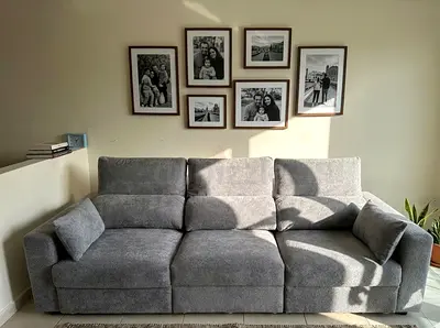 Elegant Convertible Sofa Bed Modern convertible sofa bed designed for comfort and style. Smooth fab