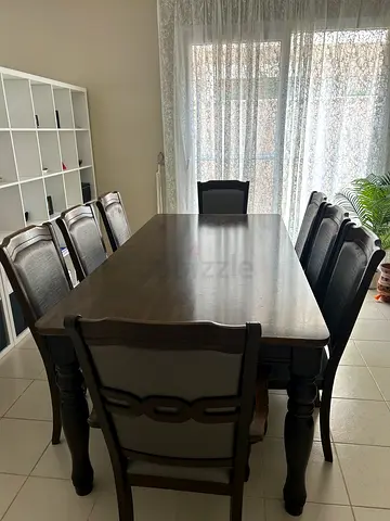 Solid wood 8-seater dining table with chairs