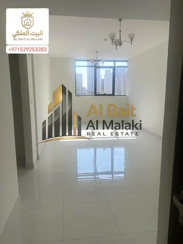 Two bedrooms, a living room, and a balcony in Al Taawun, right on the Dubai exit. Brand new building, first occupancy. Free parking. Open and beautiful view. Building is one month old. Built-in wardro