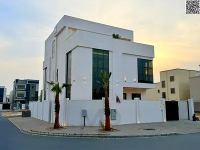 A villa with all-inclusive price (electricity, water, and air conditioning) on ​​the main street, ready to move in, in one of Ajman's most prestigious