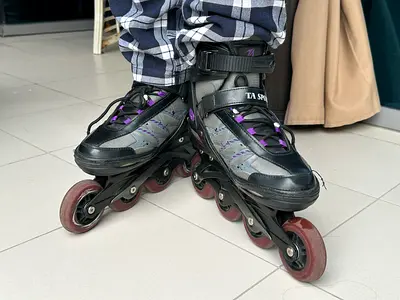 Roller skates with protective gear