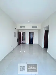 **2 Bedrooms & Living Room with Balcony and Central AC – Premium Living in Al Rawda 1