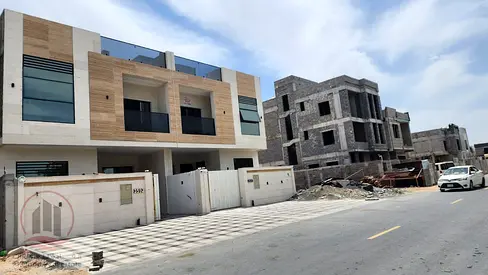 Villa for sale in Al Helio area, Ajman. Modern design. Ground floor, first floor and roof (5 master bedrooms, majlis, hall and maid's room).