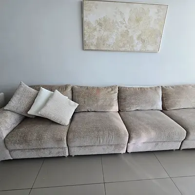 Im selling my light beige 4-seater and 1 long corner fabric sofa — comfortable, like new,
