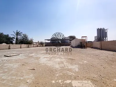 Prime location 20,000 Sqft yard with shed and 30 KW power. Rent: AED 240K per year