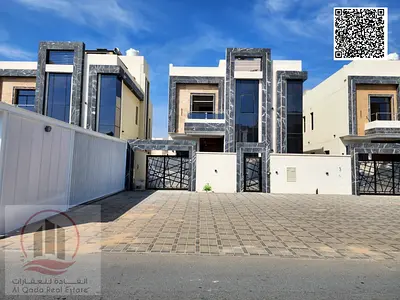 Villa for sale in Al Zahiyah, Ajman. Modern design, ground floor, first floor, and roof (5 master bedrooms, majlis, living room, and maid's room).