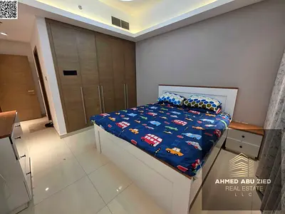 Furnished one-bedroom apartment for annual rent in Gulf Towers, Rashidiya 1, with parking, gym, and swimming pool. Excellent finishing, prime location