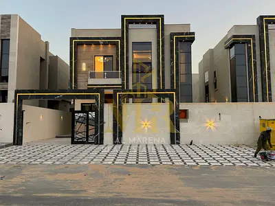 Two-story villa with a rooftop for sale in Ajman, Al Helio 2, with an area of ​​280 square meters | 5 master bedrooms | Majlis and living room | Centr