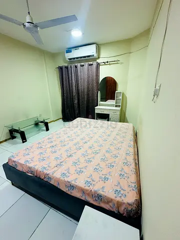 Neat Fully furnished family sharing room immediately available in Al Karama for Indian couples